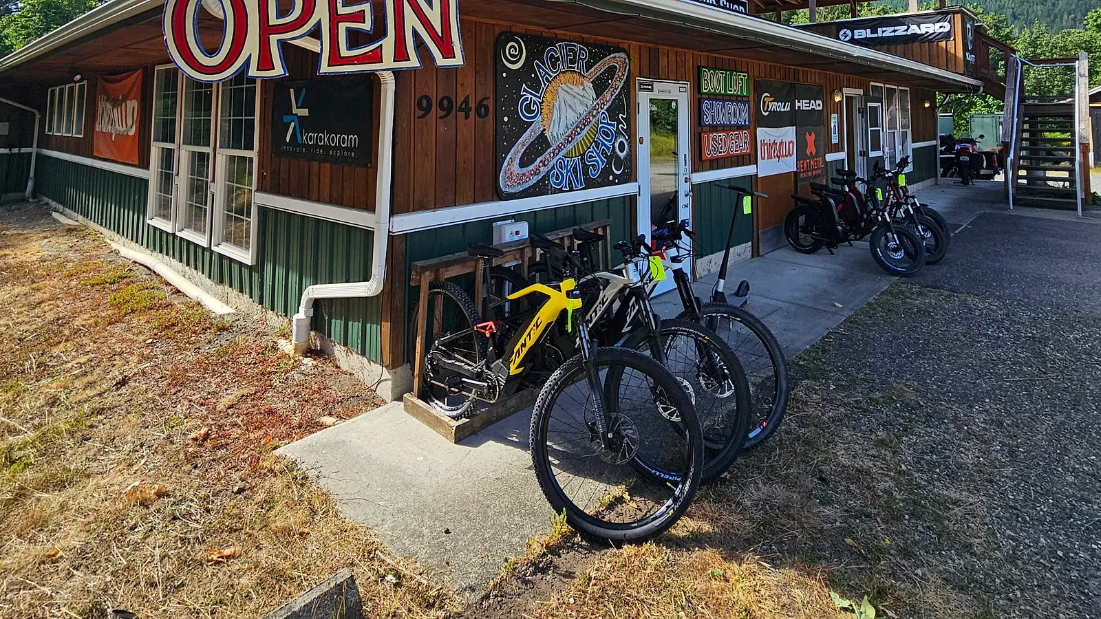 Glacier Ski Shop exterior, gear signs, and rental bikes at 9946 Mt. Baker Highway in Glacier
