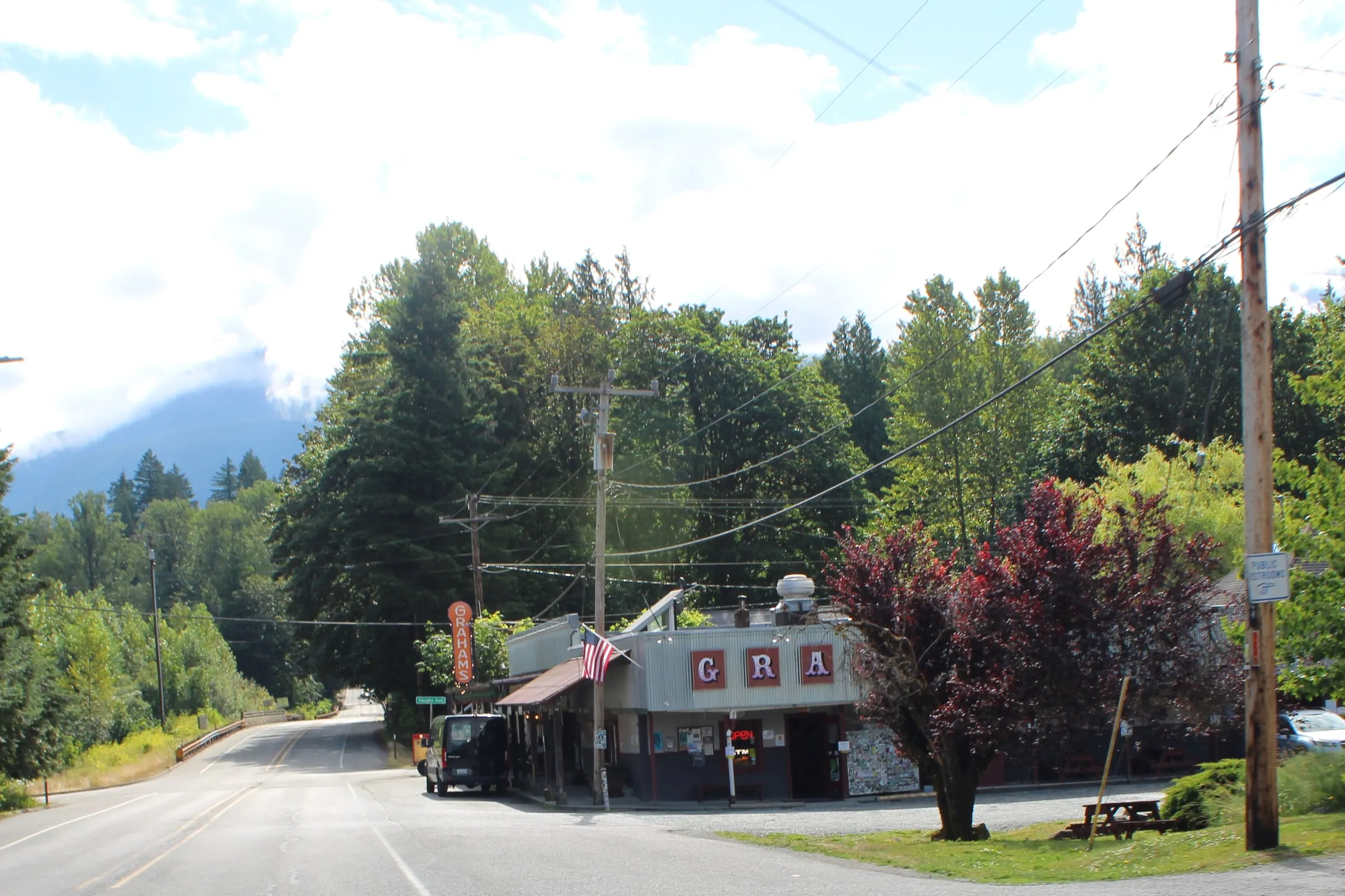 Mt Baker Highway through Glacier beside the Graham storefront and forested foothills