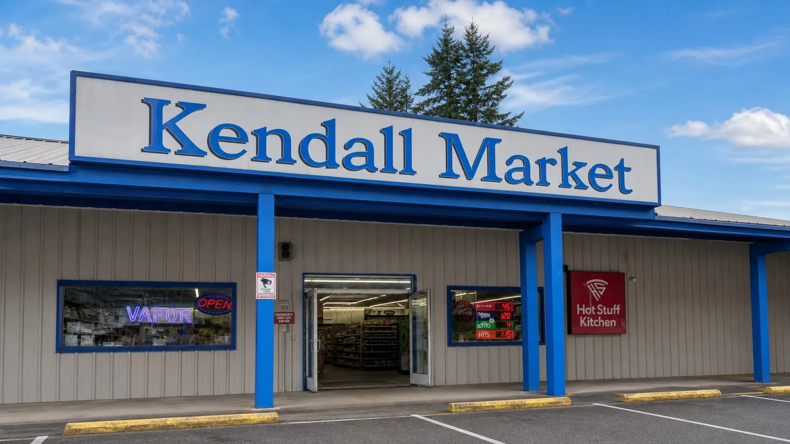 Kendall Market’s front entrance with the red Hot Stuff Kitchen sign beside the door