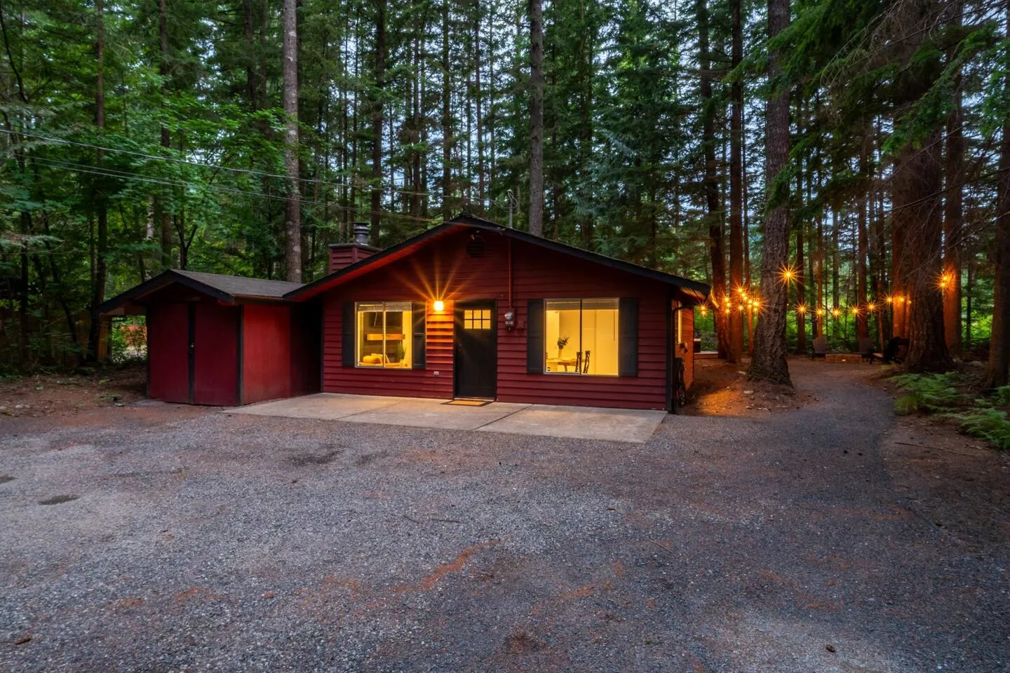 Red cabin exterior glowing at dusk