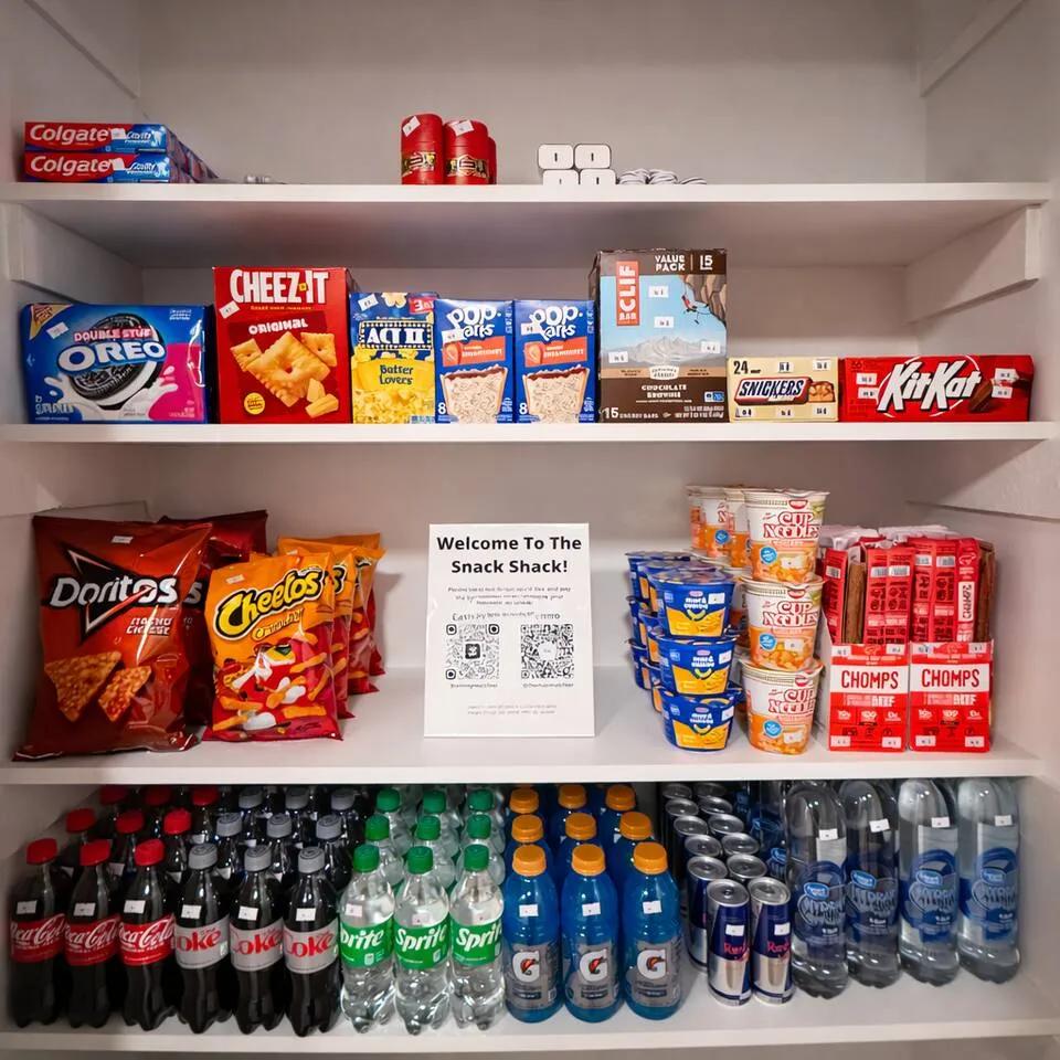 On-site snack shack shelves stocked with snacks and drinks