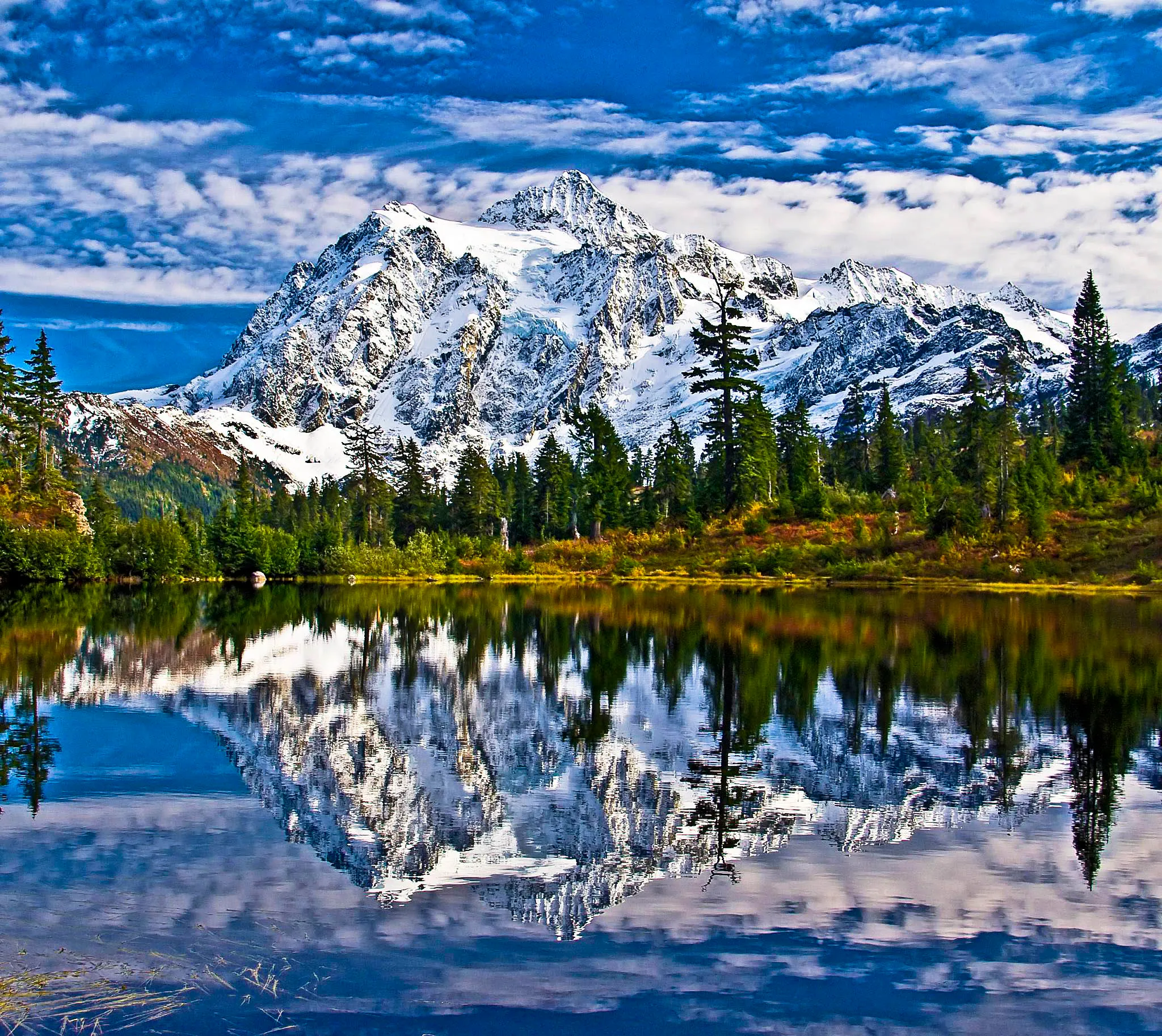 Mount Shuksan reflected in Picture Lake at Heather Meadows in autumn color