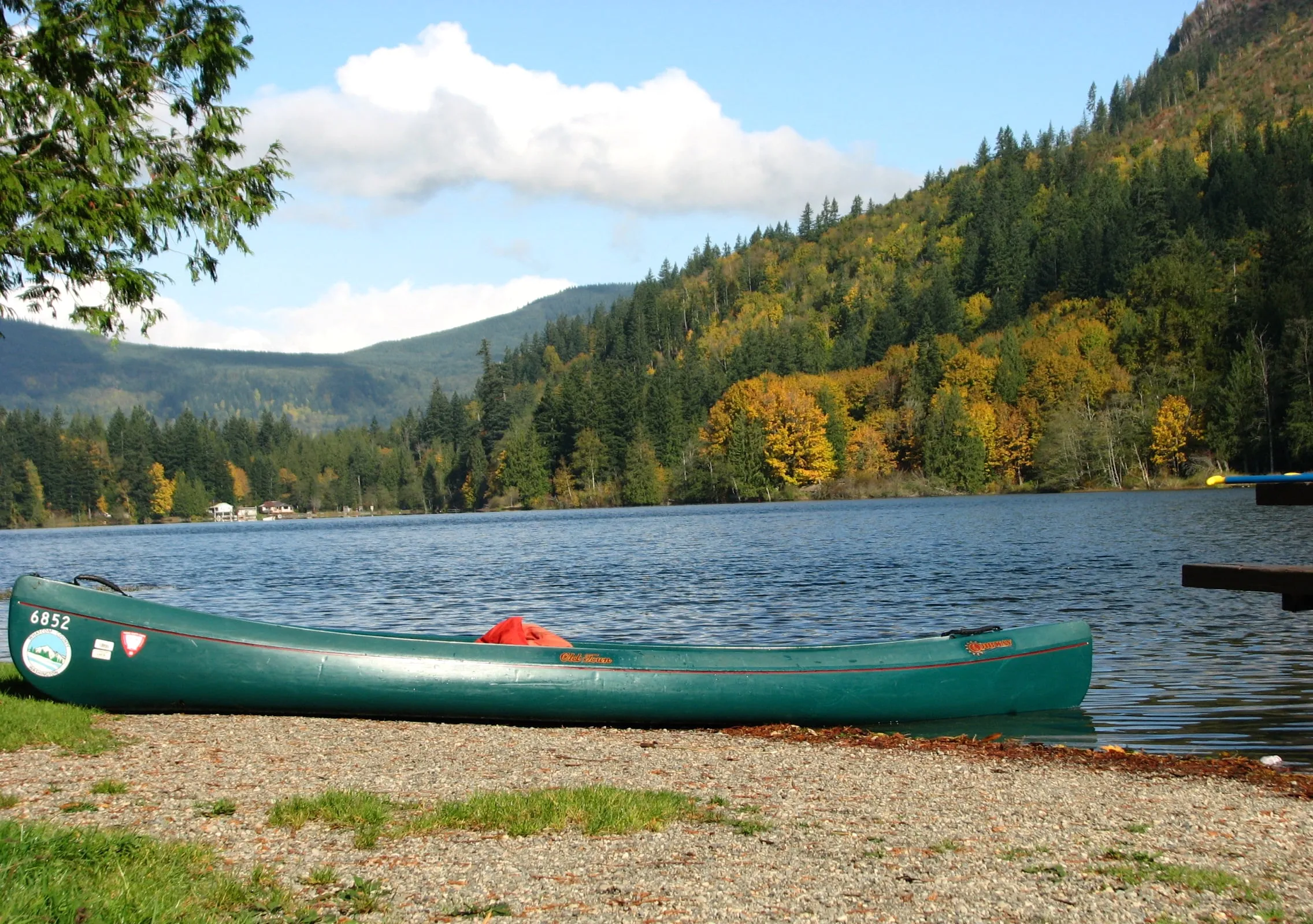 A county rental canoe on the gravel beach at Silver Lake Park