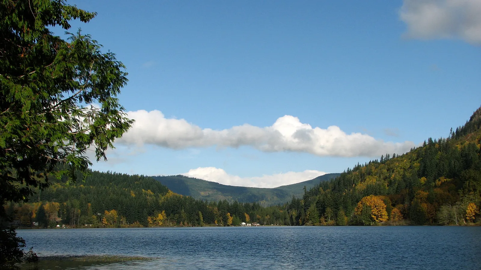 Silver Lake near Maple Falls with forested hills behind the water
